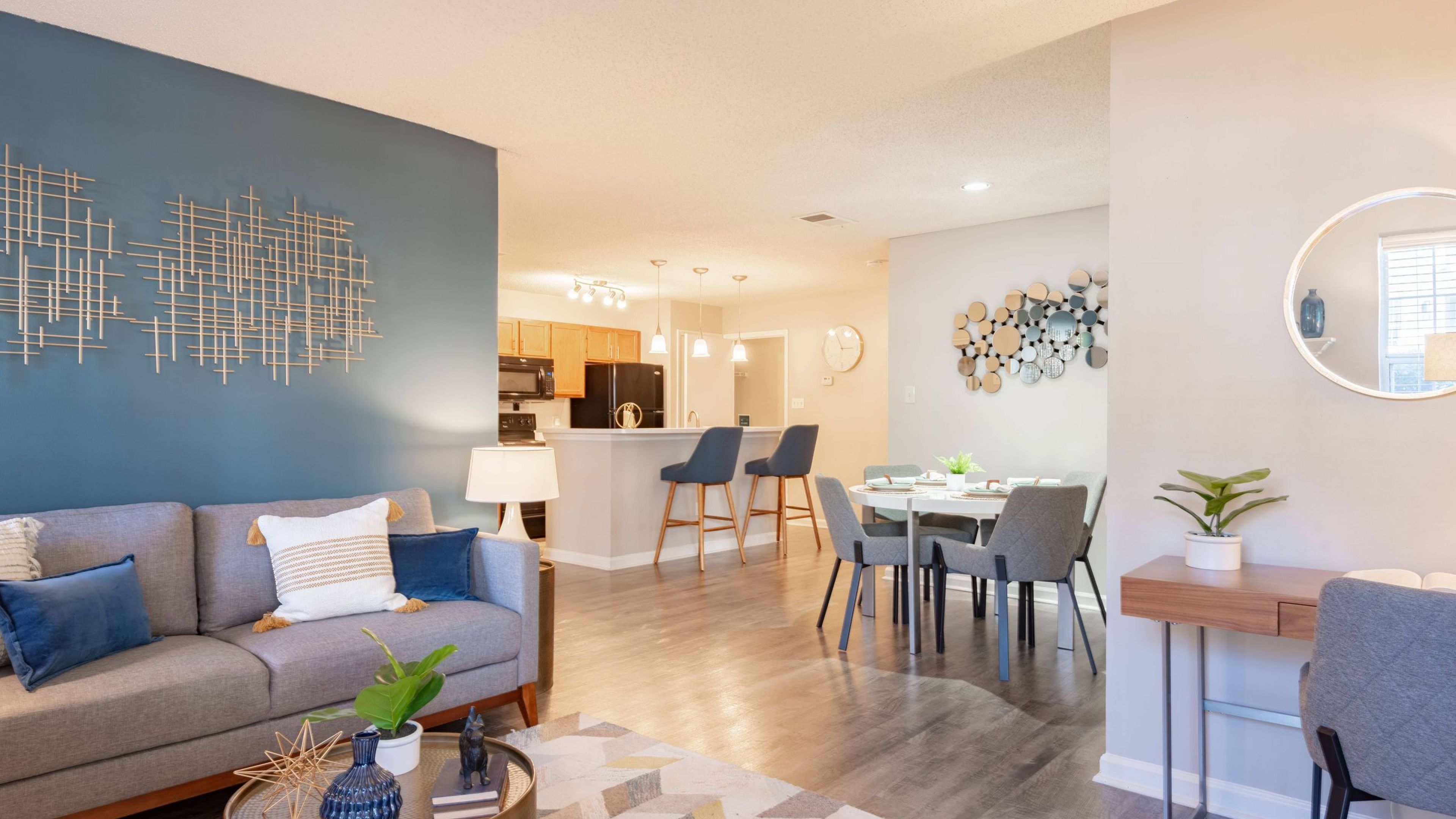 Hawthorne at the Park apartment open floor plan living area with hardwood floor.